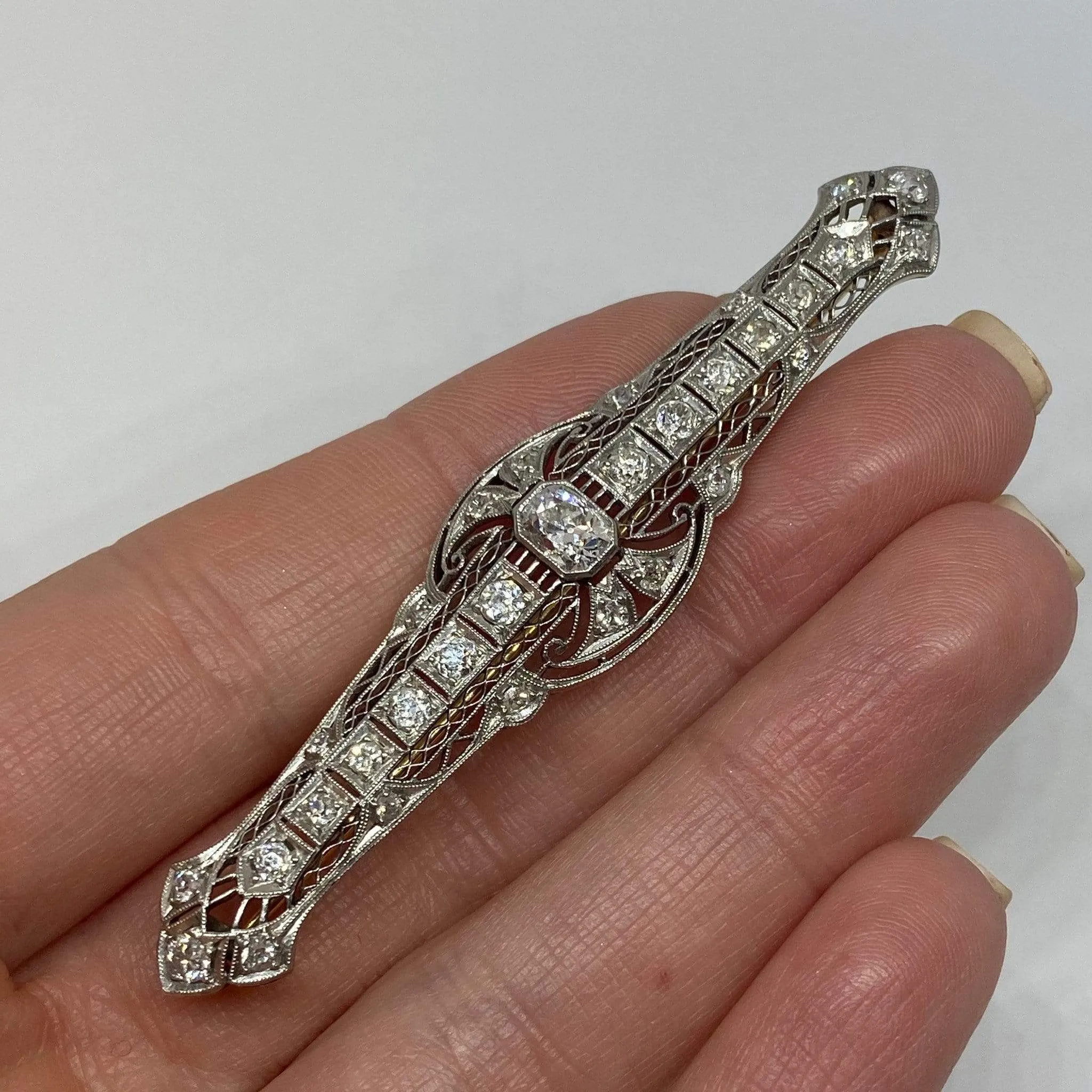 Plat 14KY 2.57CTW Antique Long Diamond Brooch