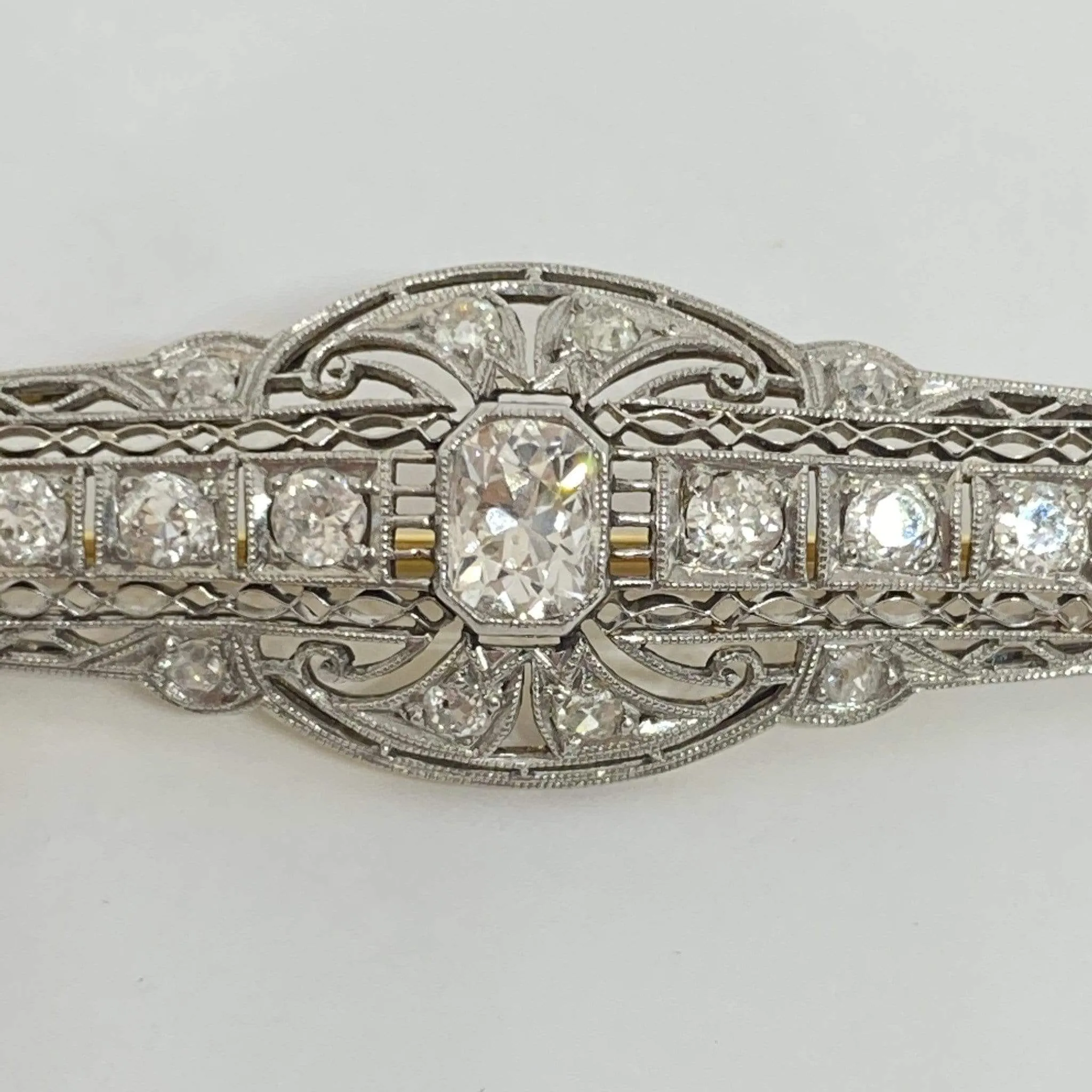 Plat 14KY 2.57CTW Antique Long Diamond Brooch