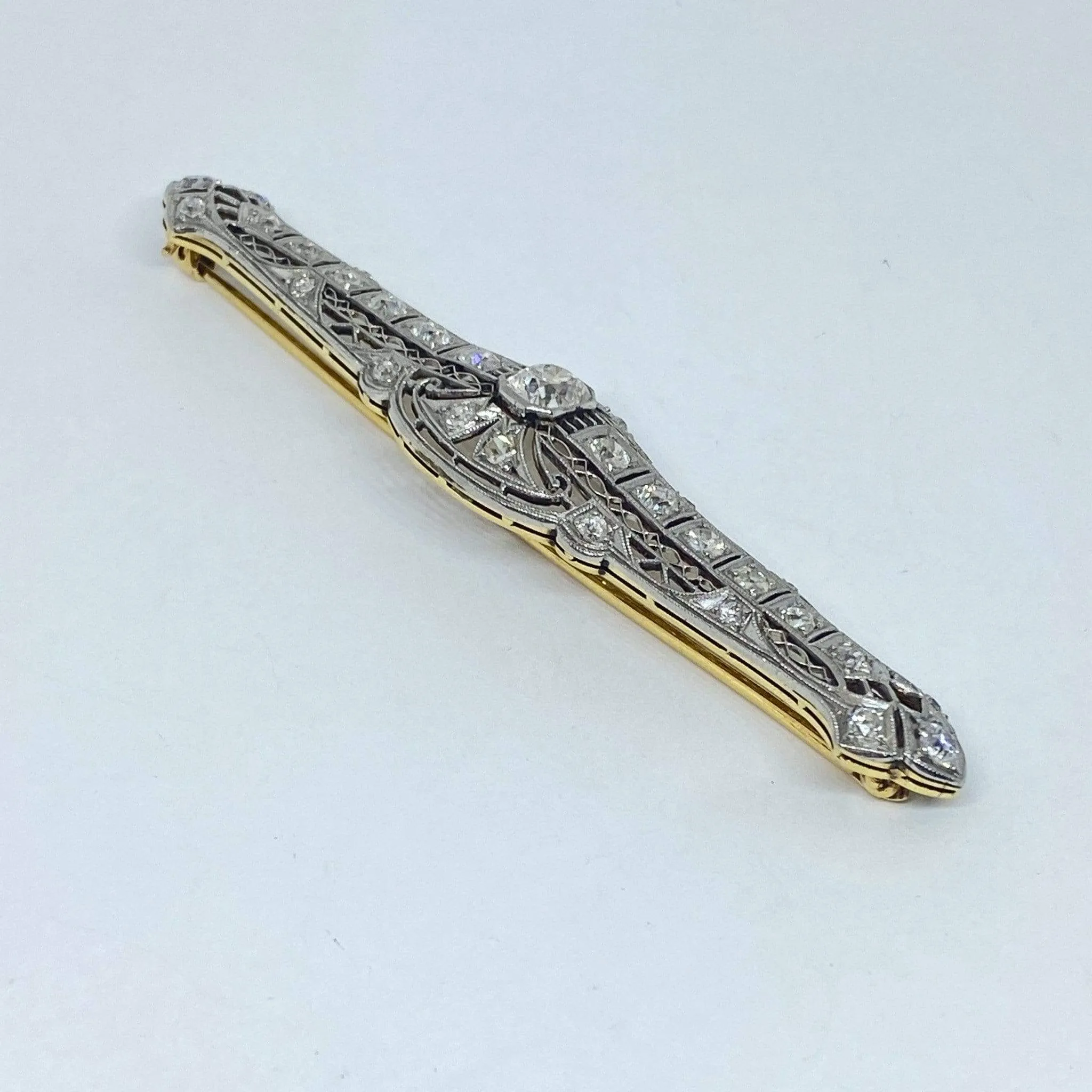 Plat 14KY 2.57CTW Antique Long Diamond Brooch