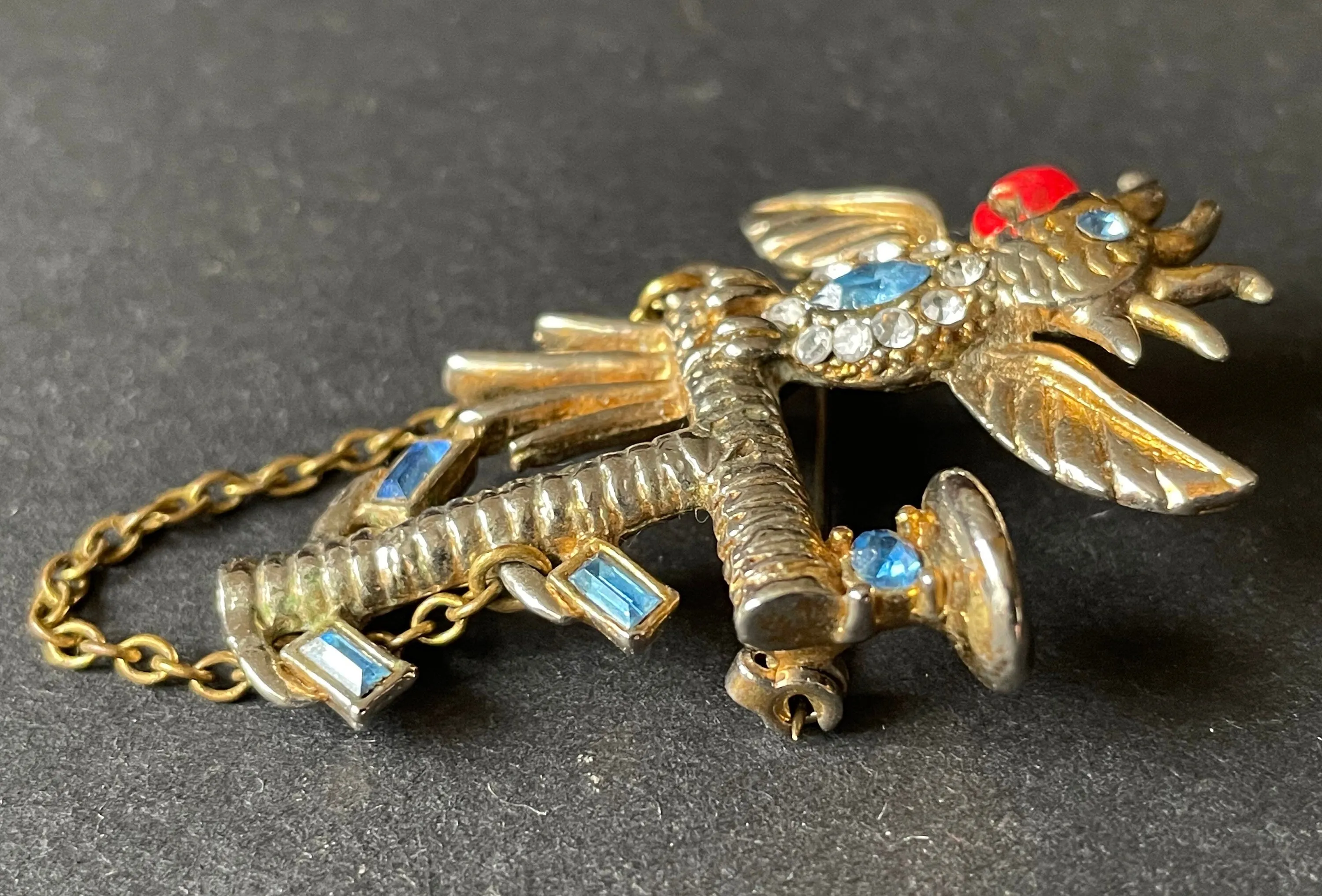 Vintage parrot / cockatoo pet bird figural brooch, gold tone with red enamel and colourful rhinestones, pot metal, Bauman Massa style?