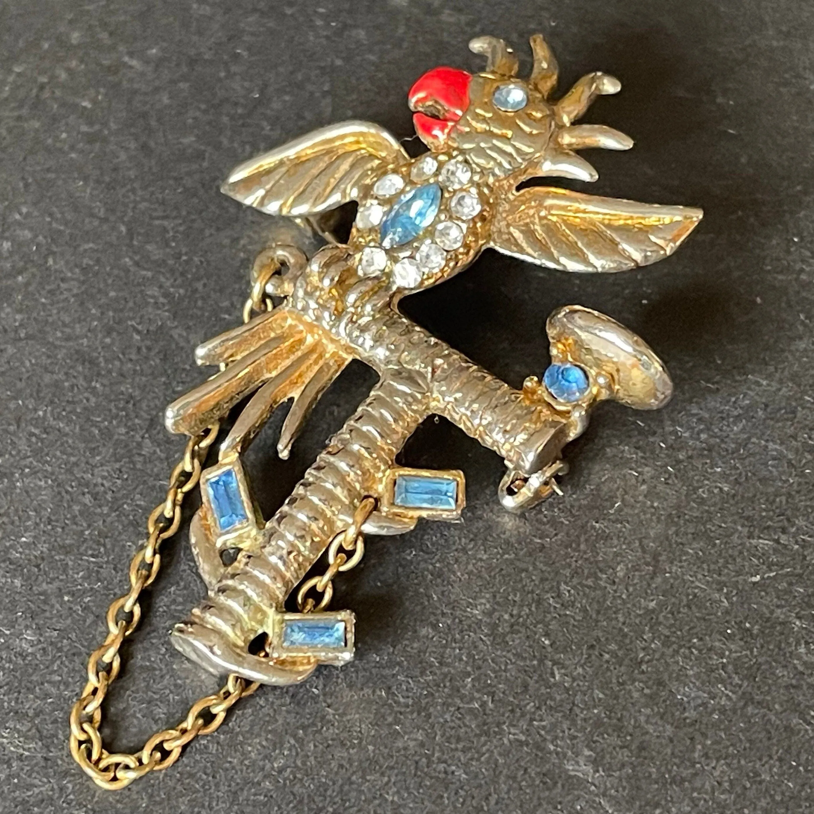 Vintage parrot / cockatoo pet bird figural brooch, gold tone with red enamel and colourful rhinestones, pot metal, Bauman Massa style?